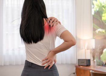 woman having muscle painful pain syndrome shoulder and neck pain.  rheumatism, fibromyalgia ,  cervical spine. scapular pain.